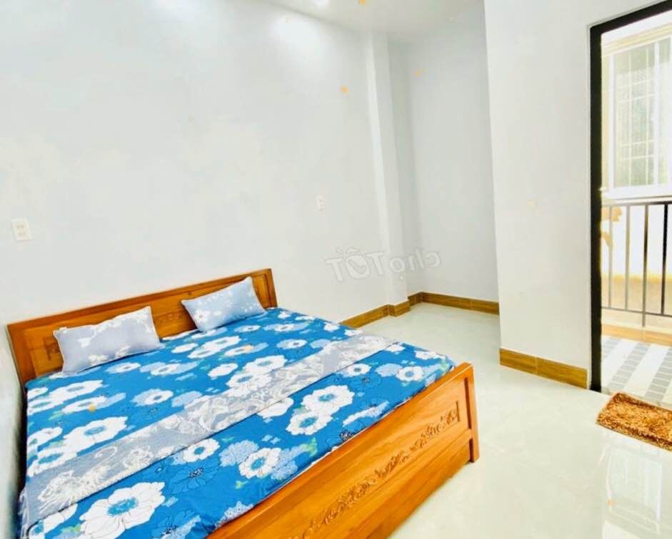 nhà chợ bình chánh QL1A 1tr1lau 2 phòng ngủ 2wc mặt tiền 5m