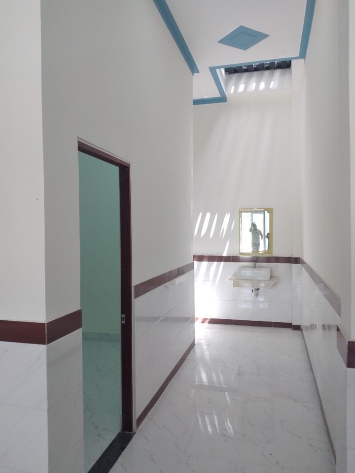 Cần bán nhà lầu trệt sân xe hơi dt 5.25×28 m2 nằm trung tâm tpk tân uyên bình dương