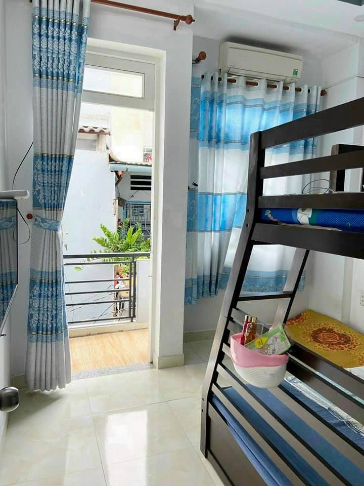 NHÀ BÁN 972 QUANG TRUNG P8 GÒ VẤP Dt: 3m3 x 8m6 XD trệt lầu 2pn,2wc Hẻm trc nhà 2m