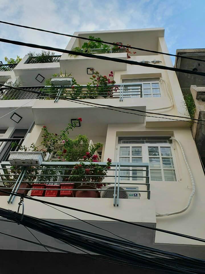 BÁN NHÀ PHƯỜNG 7 BÌNH THẠNH DT: 4 x 11 vuông vức không lộ giới, 1 Trệt, 3 lầu đúc. 5 pn 6wc