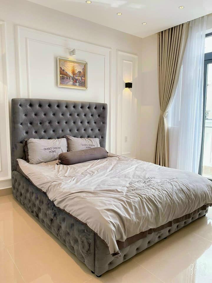 Bán nhà QUANG TRUNG P8 GÒ VẤP. DT: 4m x 16m. Nhà 1 trệt 1 lửng 3 lầu. 4PN ,5 toilet, gara xe hơi