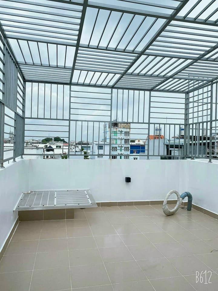 Bán nhà QUANG TRUNG P8 GÒ VẤP. DT: 4m x 16m. Nhà 1 trệt 1 lửng 3 lầu. 4PN ,5 toilet, gara xe hơi