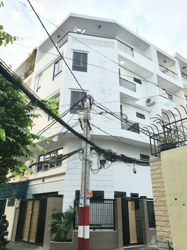 Bán Nhà Kiểu biệt Thự Góc 2 MT , OTO vào nhà, Hoàng Hoa Thám, P5 Phú Nhuận