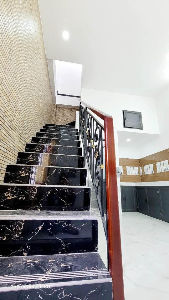 Chính chủ cần bán nhà tại Mỹ Phước 63m2 nhà mới xây 1 trệt 1 lầu 3pn lộ ô tô
