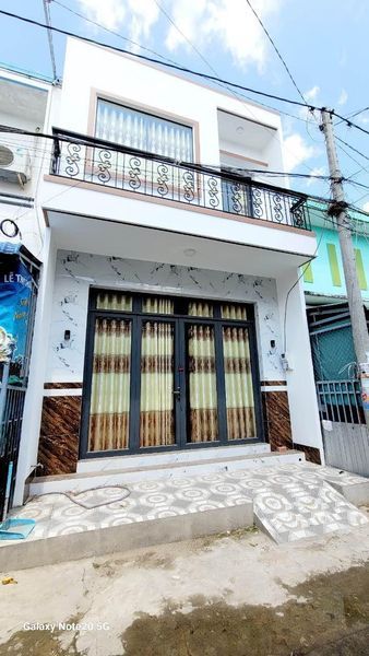 Chính chủ cần bán nhà tại Mỹ Phước 63m2 nhà mới xây 1 trệt 1 lầu 3pn lộ ô tô