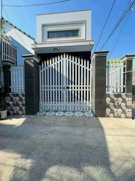 NHÀ 1 TRỆT 1 GÁC LỬNG GỐC 2 MẶT TIỀN. ẤP 4 TRUNG AN MỸ THO TG CÁCH HL93 KHOẢNG 50M