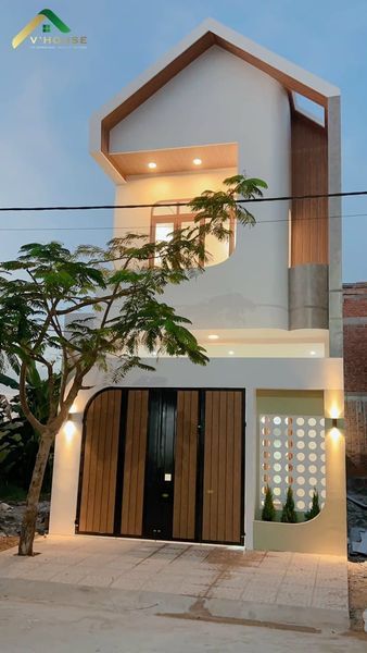 NHÀ 1 TRỆT 1 LẦU KDC Hoàng có sân ôtô, giếng trời, lệch tầng cộng hưởng thêm tạo sự thông thoáng