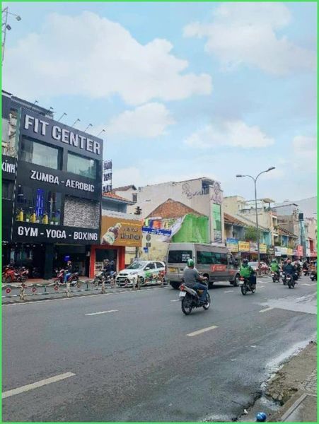 Bán tòa nhà góc mặt tiền, Quận Phú Nhuận gần Phan Đăng Lưu, 350m2, 6 tầng 16 x 18 nở hậu